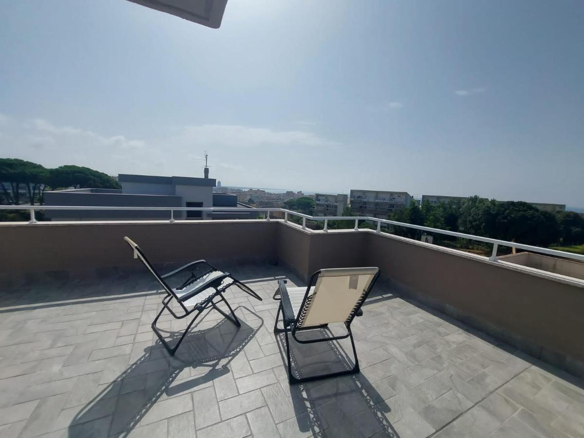 Апартаменты Terrazza Delle Rose Неттуно Экстерьер фото